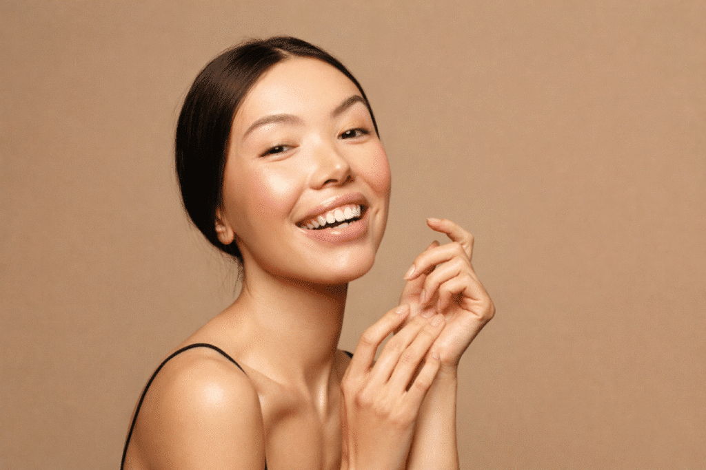 Beautiful woman has glowing skin after fractional CO2 treatment