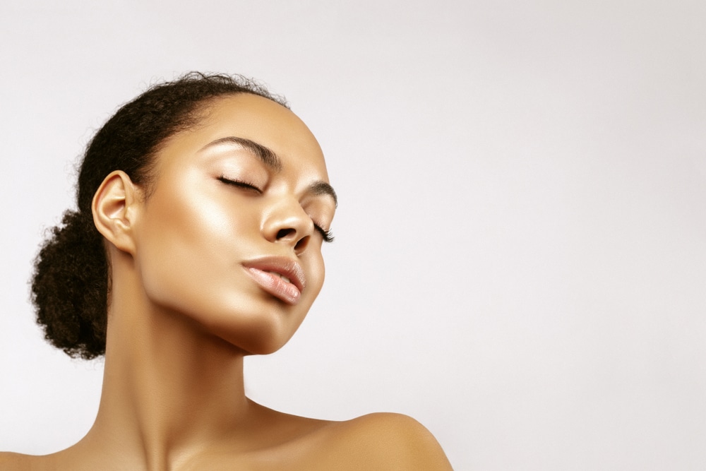 Woman with fresh glowy skin from microdermabrasion in Littleton, CO