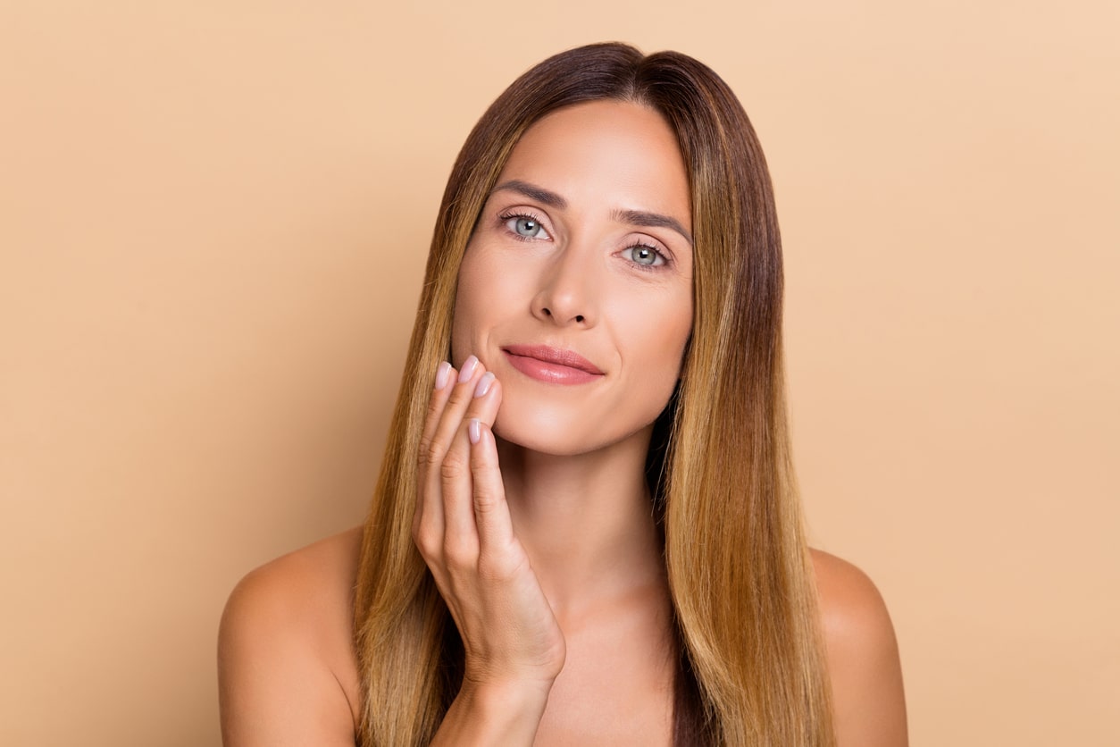Woman with fresh skin after microneedling with PRP in Littleton, CO